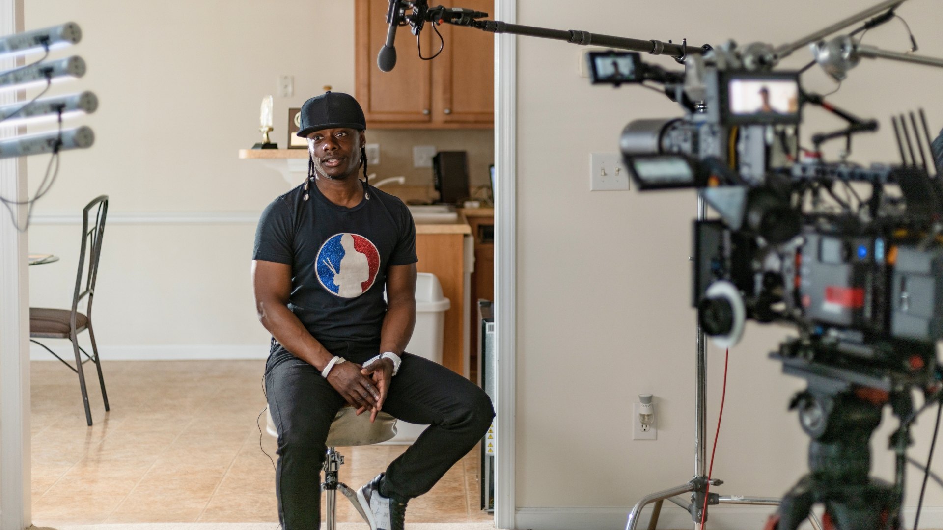 Subject seated for a lit interview